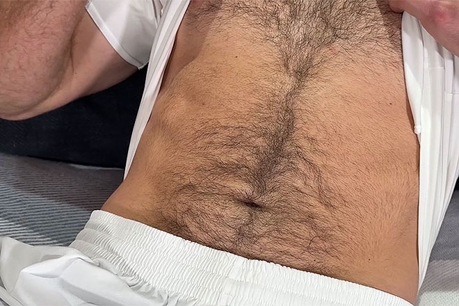 Young Muscular & Super Hairy Footballer Image