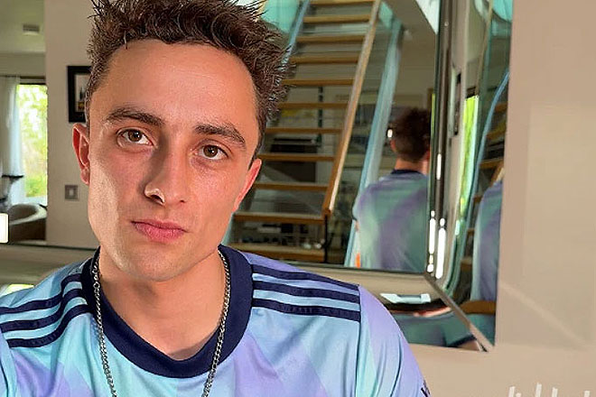 Young Straight Footballer Shows off his Lean Body & Edges his Long Uncut Cock Image