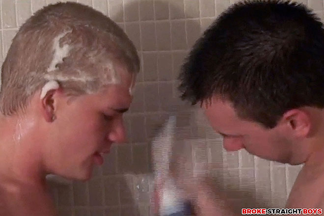 Three Dudes Have Group Fun In The Shower Image